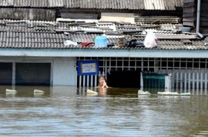 A Woman Submerged in Water in Thai Floods