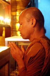 Buddhist Monk in Prayer